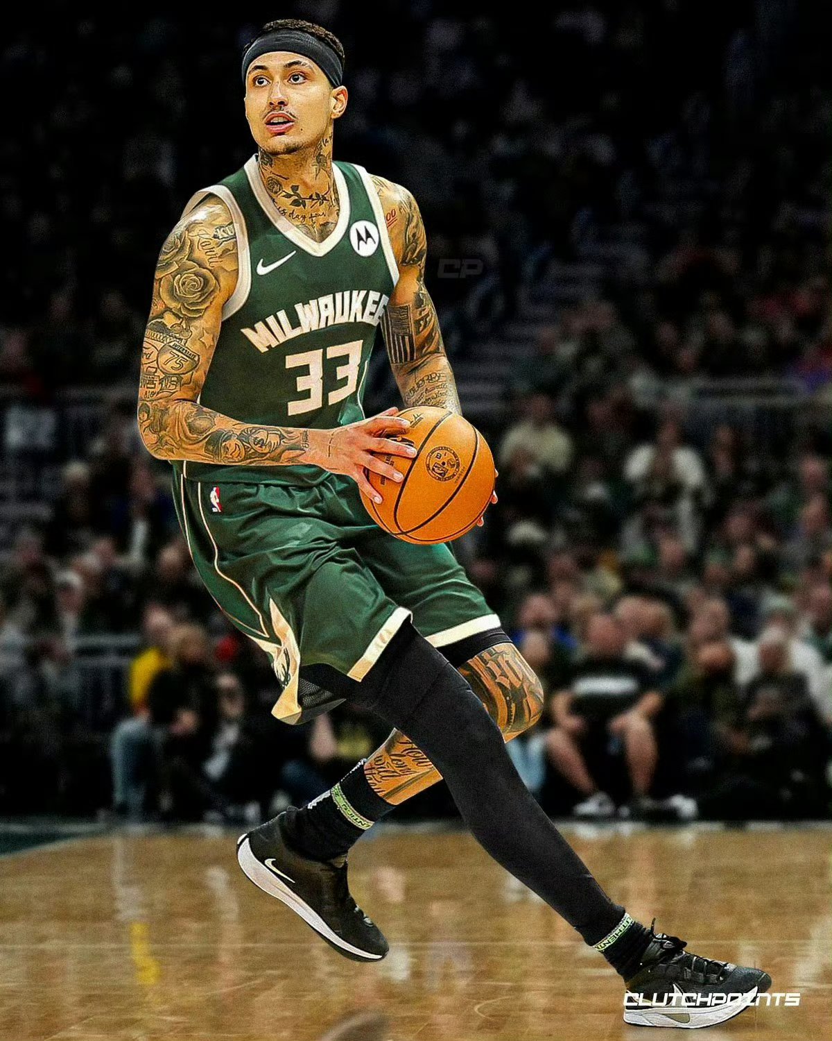 雄鹿队年轻后卫米德尔顿逐渐成长为球队核心 雄鹿队年轻后卫米德尔顿逐渐成长为球队核心